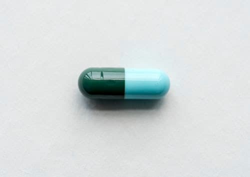 Close-up of a single medicine capsule